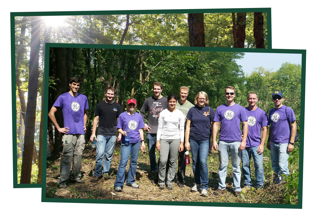 Group of volunteers in purple shirts.