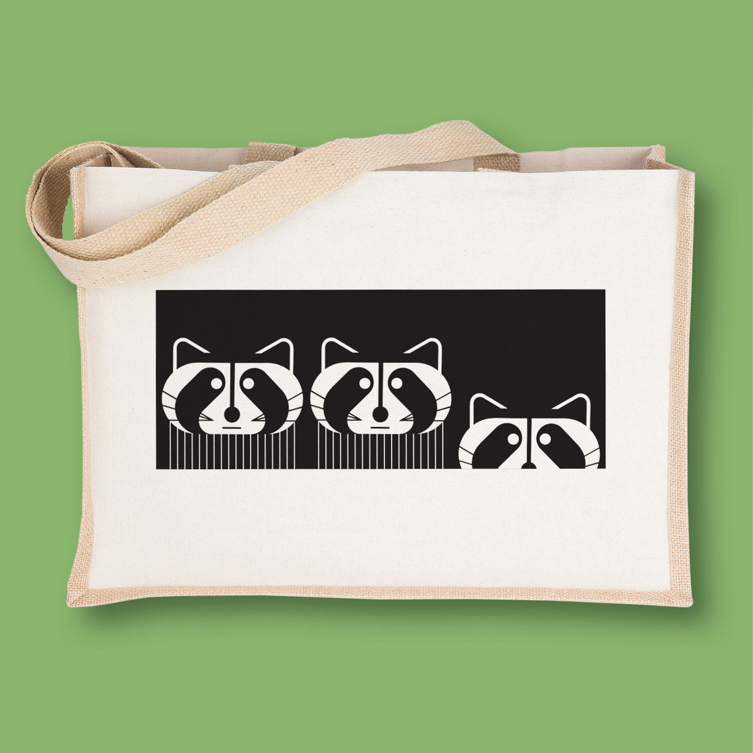 Canvas bag with screen printed raccoons on front.